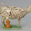 Pearlware pottery cow creamer decorated with enamels under the glaze, circa 1810