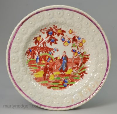 Small pearlware pottery plate decorated with a Chinoiserie print under the glaze, circa 1830