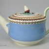 Pearlware pottery teapot decorated with blue slip, inlaid brown and enamels, circa 1810