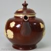 Astbury Whieldon type red ware teapot decorated with applied pipe clay floral sprigs, circa 1750