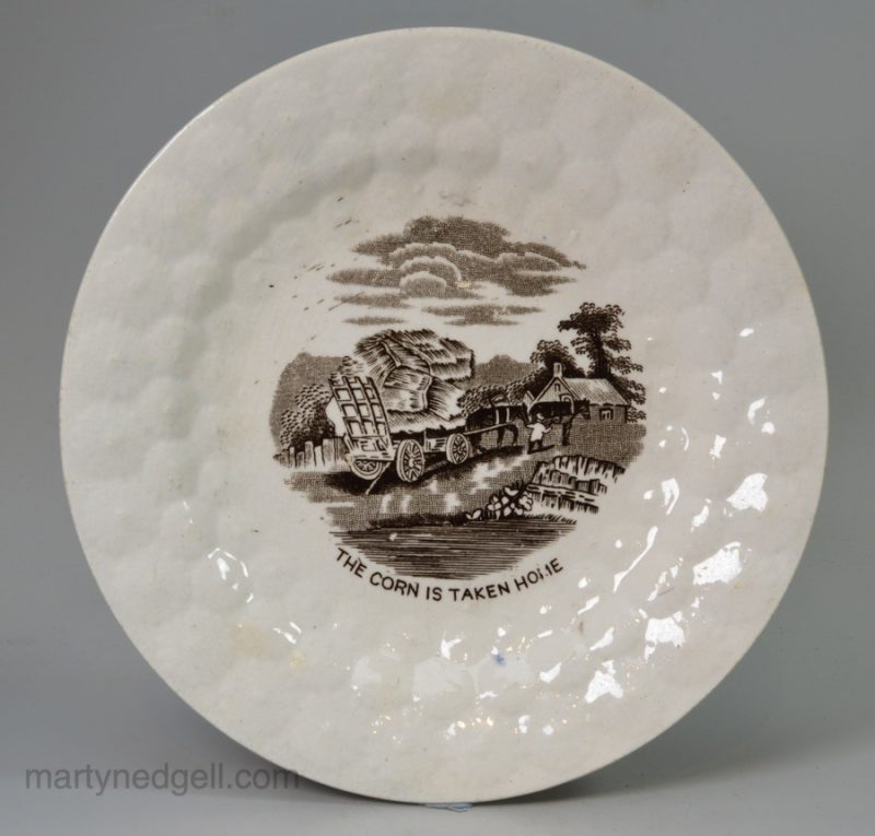 Pearlware pottery child's plate "The Corn is Taken Home", circa 1840