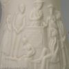 Small parian jug moulded with slavery scenes from Uncle Tom's cabin, circa 1850
