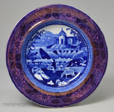 Pearlware pottery cup plate decorated with blue transfer and lustre rim, circa 1820