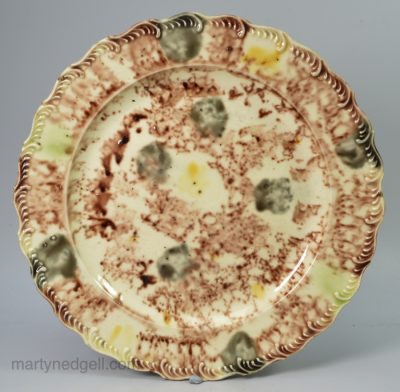 Creamware pottery plate decorated with oxide colours under a lead glaze, Whieldon type, circa 1770