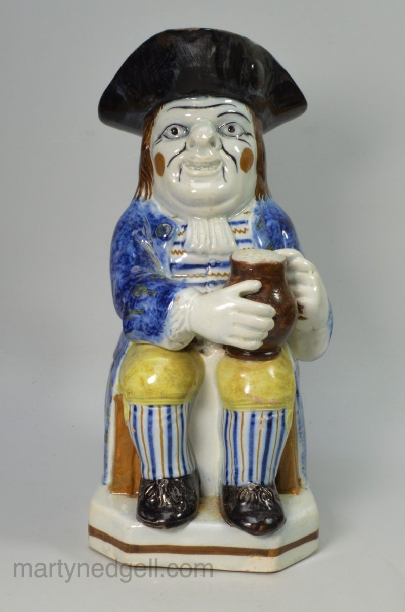 Prattware pottery Toby jug and lid, decorated with enamels under a pearlware glaze, circa 1820