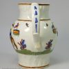 Prattware pottery jug, Military Review, decorated with enamels under a pearlware glazer, circa 1810