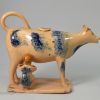 Buff coloured pottery cow creamer, circa 1820