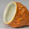 Pearlware pottery fox head stirrup cup decorated under the glaze, circa 1820