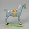Prattware pottery horse decorated with colours under a pearlware glaze, circa 1820