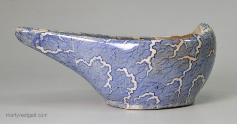 Pearlware pottery pap boat decorated with blue transfer under the glaze, circa 1820
