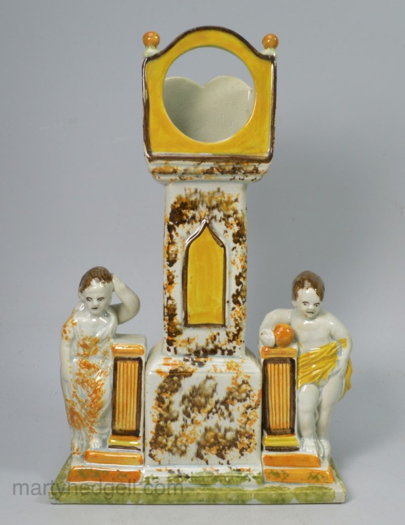 Prattware pottery watch stand decorated with colours under a pearlware glaze, circa 1820