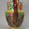 Pearlware Bacchus jug decorated with enamels over the glaze, circa 1820