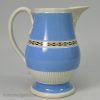 Pearlware pottery serving jug decorated with blue and brown slip, circa 1800
