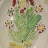 Pearlware pottery toy plate moulded with flowers, circa 1800