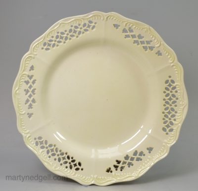 Creamware pottery pierced plate, circa 1780, one of three available