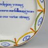 Prattware pottery child's plate decorated with enamels under a pearlware glaze, circa 1820