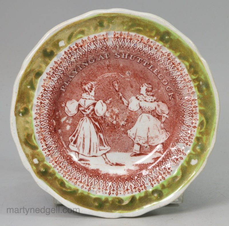 Pearlware pottery child's plate "PLAYING AT SHUTTLECOCK", circa 1830