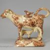 Creamware pottery cow creamer decorated with brown oxide under the glaze, Whieldon type, circa 1770