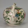 Staffordshire white saltglaze stoneware teapot decorated with floral enamels, circa 1760