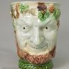 Pearlware pottery Bacchus mug decorated with oxides under a lead glaze, circa 1790, probably Wood Family Staffordshire