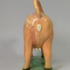Pearlware pottery cow creamer with an agate buff pottery body, circa 1820