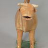 Pearlware pottery cow creamer with an agate buff pottery body, circa 1820