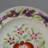 Small pearlware pottery plate decorated with enamels and pink lustre, circa 1820