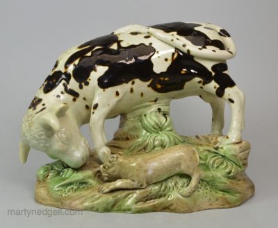 Pearlware pottery bull baiting group, decorated with colours under the glaze, circa 1790, probably Wood Family
