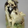 Pearlware pottery bull baiting group, decorated with colours under the glaze, circa 1790, probably Wood Family