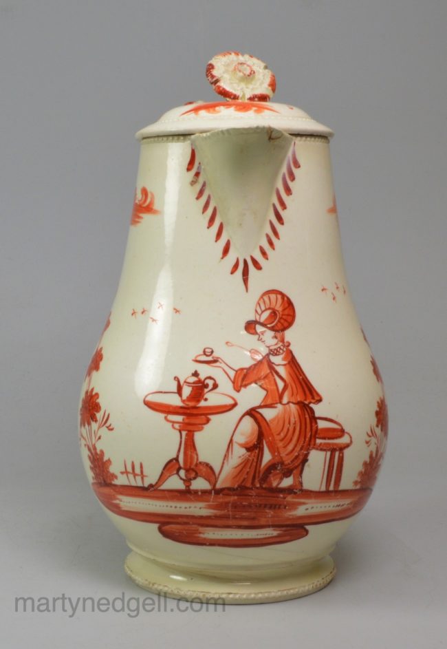Creamware pottery milk jug decorated in red with "Miss Pitt" pattern, circa 1775