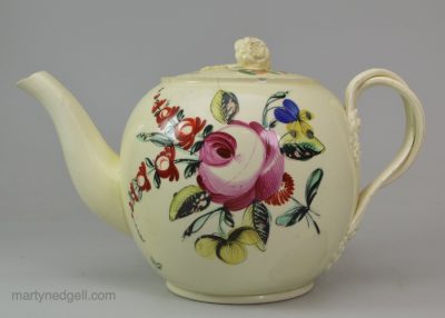 Creamware pottery teapot decorated with overglaze enamels, circa 1770