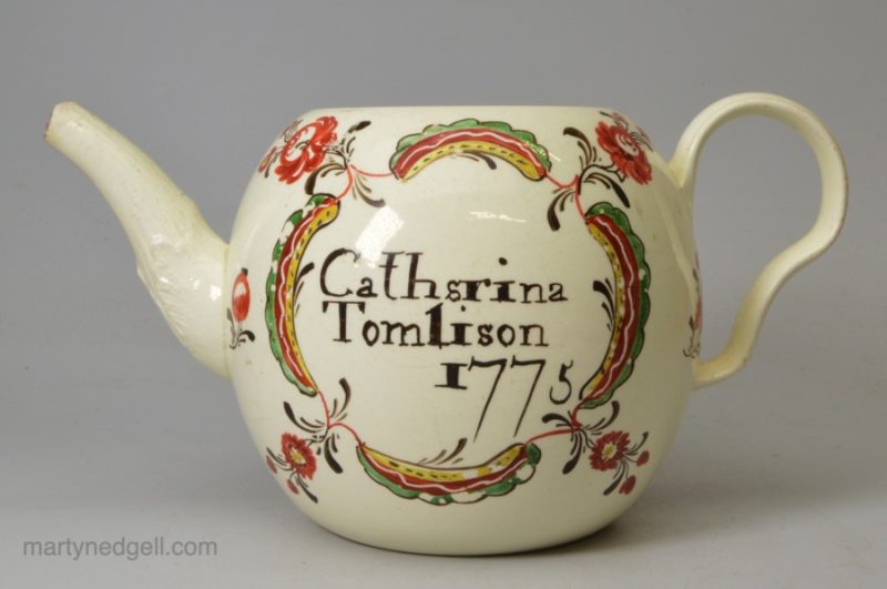 Lidless creamware pottery teapot, Cathsrina (sic) Tomlinson, 1775