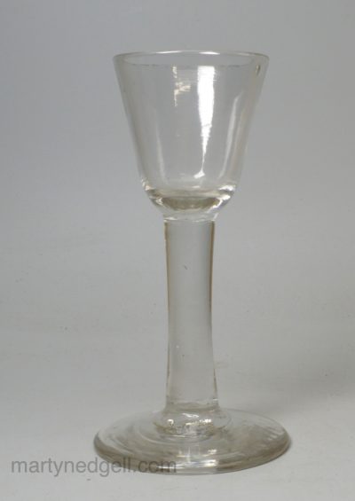 Heavy stemmed English wine glass, circa 1740