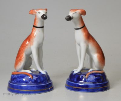 Pair German porcelain copies of Staffordshire greyhounds, circa 1900