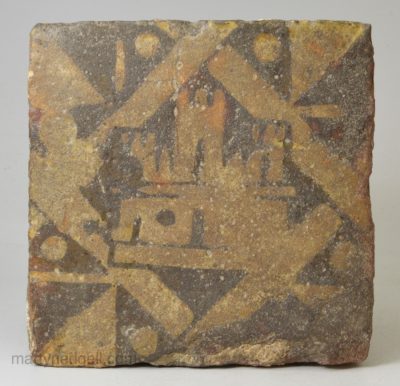 English medieval encaustic floor tile decorated with a castle, circa 1350-1400
