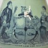 Pearlware pottery jug covered with green slip and printed with an American Temperance Maine Act commemoration, circa 1855