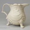 Staffordshire white. saltglaze stoneware pectin shell moulded jug, circa 1750