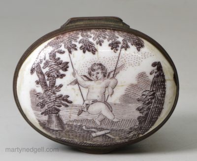 Bilston enamel patch box printed with cupid on a swing, circa 1780