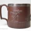 Dark brown stoneware mug with a sprig of Venus, circa 1800, probably Hollins, Staffordshire