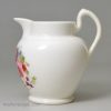 Miniature porcelain jug painted with flowers, circa 1840