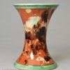 Mochaware spill vase decorated with combed slip on a creamware pottery body, circa 1820