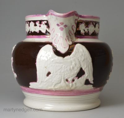 Pearlware pottery jug decorated with pink and copper lustre, circa 1820