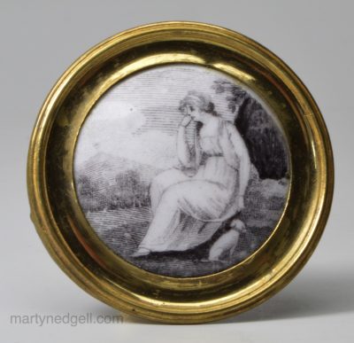 Bilston enamel cloak pin printed with a woman and her dog, circa 1780