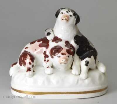 Staffordshire porcelain figure of Spaniel puppies at play, circa 1840