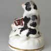 Staffordshire porcelain figure of Spaniel puppies at play, circa 1840