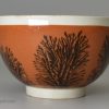 Pearlware tea bowl and saucer decorated with dendritic mocha, circa 1810