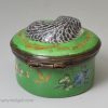Bilston enamel patch box moulded with a sleeping cat, circa 1770