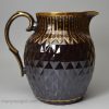 Pearlware pottery jug decorated with dark brown slip and gilding, circa 1810, probably Wilson Pottery