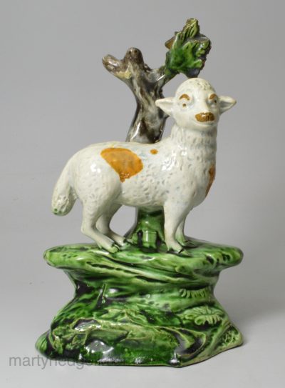 Pearlware pottery sheep decorated with colouring under the glaze, circa 1800