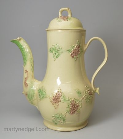 Staffordshire creamware coffee pot decorated with floral sprigs coloured under the glaze, circa 1765